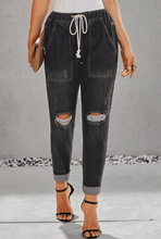 Load image into Gallery viewer, Women ripped knee loose fitting baggie jeans with white waist strap
