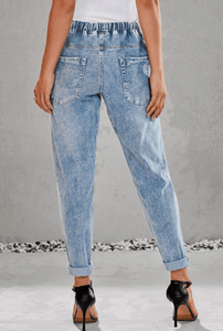 Women ripped knee loose fitting baggie jeans with white waist strap