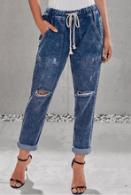 Load image into Gallery viewer, Women ripped knee loose fitting baggie jeans with white waist strap
